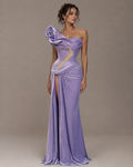 The Lilac Hour — Lilac velvet, wrapped and knotted at the hip, with an oversized rose at the shoulder and a split that runs to the waist, made to measure